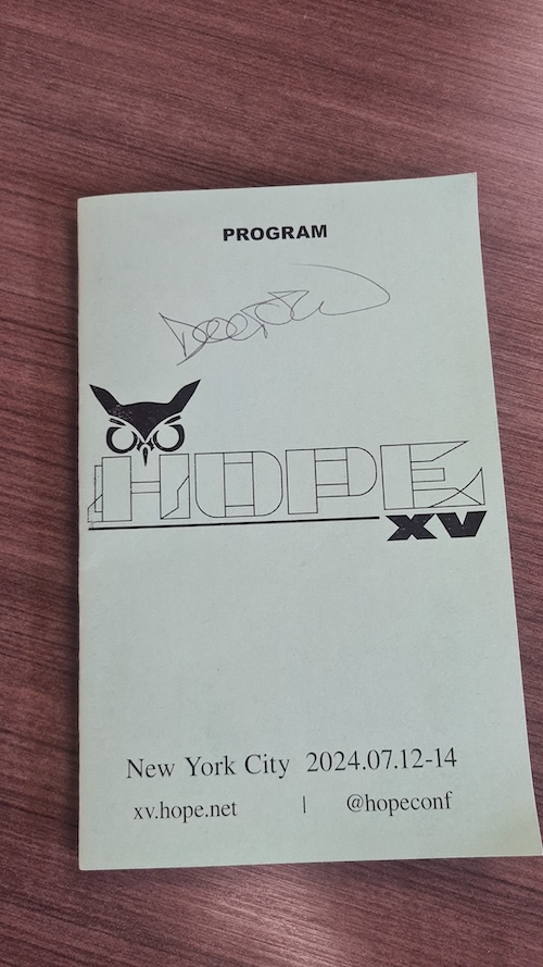 image of a HOPE XV program with Cory Doctorow's autograph